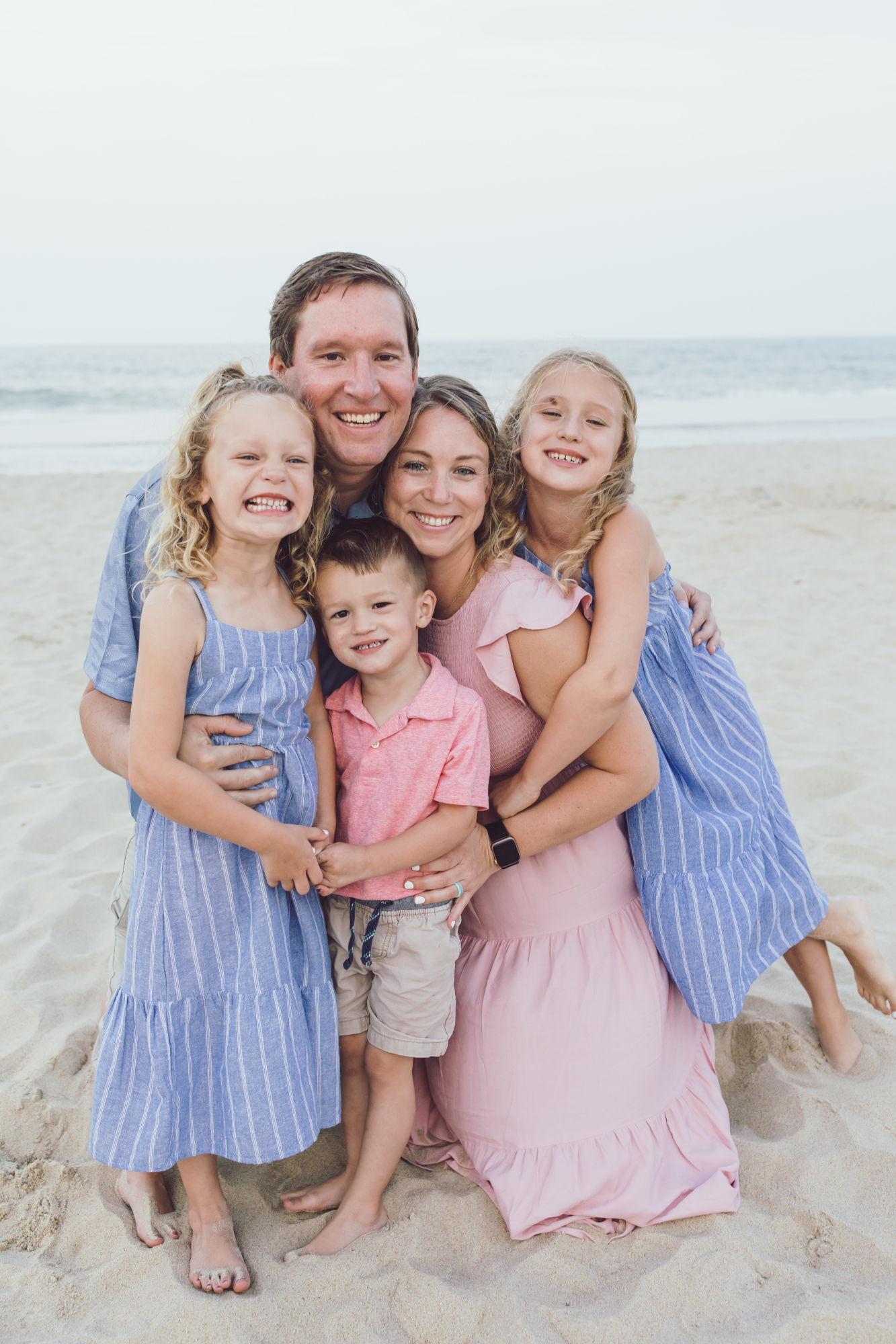 Candid family moment captured by beach family photographer