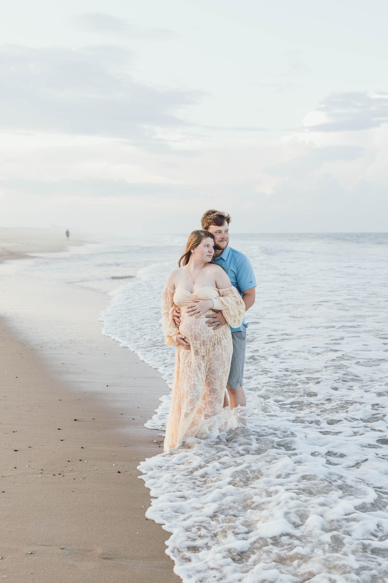 Couple beach portrait by family beach photographer in Delaware